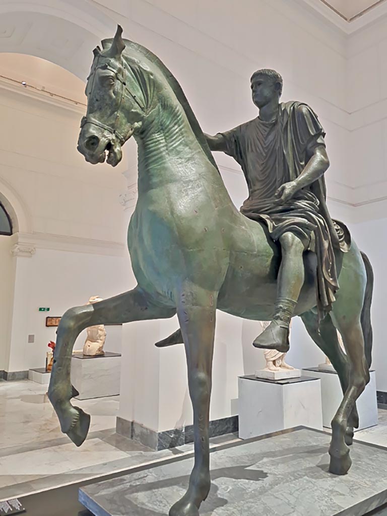Arch of Caligula, Pompeii. April 2023. Equestrian statue found in pieces beneath the arch and rebuilt.
On display in “Campania Romana” gallery in Naples Archaeological Museum.  Photo courtesy of Giuseppe Ciaramella.