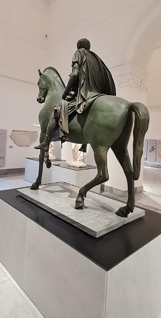 Arch of Caligula, Pompeii. April 2023. Equestrian statue found in pieces beneath the arch and rebuilt.
On display in “Campania Romana” gallery in Naples Archaeological Museum.  Photo courtesy of Giuseppe Ciaramella.