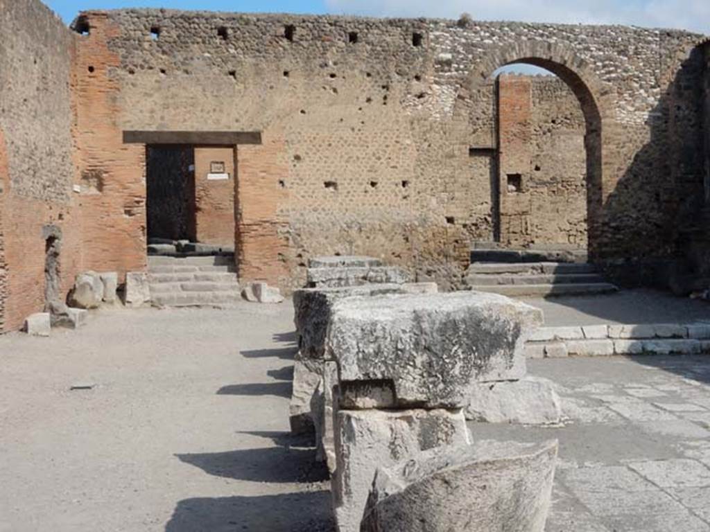 Arched entrance in north-west corner of Forum (right). May 2015. 
Photo courtesy of Buzz Ferebee.