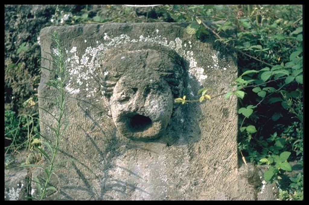 I.13.10 Pompeii. Fountain outside I.13.10, with relief of head of Juno with diadem. Photographed 1970-79 by Günther Einhorn, picture courtesy of his son Ralf Einhorn.