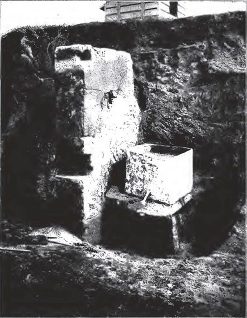 Water column on north-west corner of II.2 on Vicolo di Octavius Quarto. 1916-17.
The top of the water column is shown during excavation. 
On it was found a lead tank which had two pipes, one presumably bringing water in and one to take it out. 
See Notizie degli scavi di antichità: Vol 14, 1917. Roma: Real Accademia dei Lincei. (p. 255).