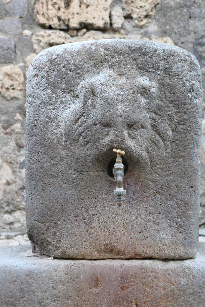 Fountain outside VI.16.28 on Vicolo dei Vettii. December 2018. 
Looking east. Photo courtesy of Aude Durand.