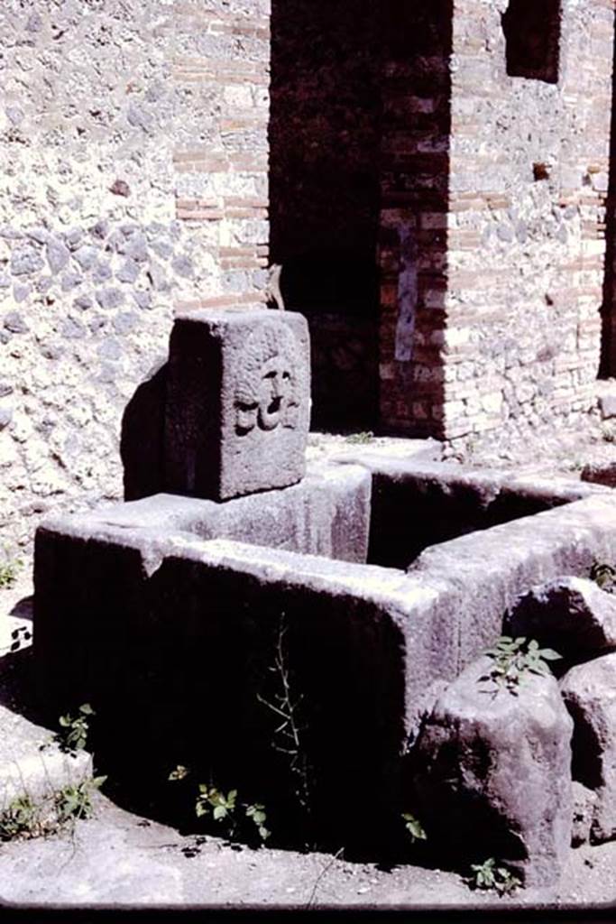 Fountain at VII.11.5 on Vicolo della Maschera, Pompeii. 1966. Looking south-east. Photo by Stanley A. Jashemski.
Source: The Wilhelmina and Stanley A. Jashemski archive in the University of Maryland Library, Special Collections (See collection page) and made available under the Creative Commons Attribution-Non Commercial License v.4. See Licence and use details.
J66f0587