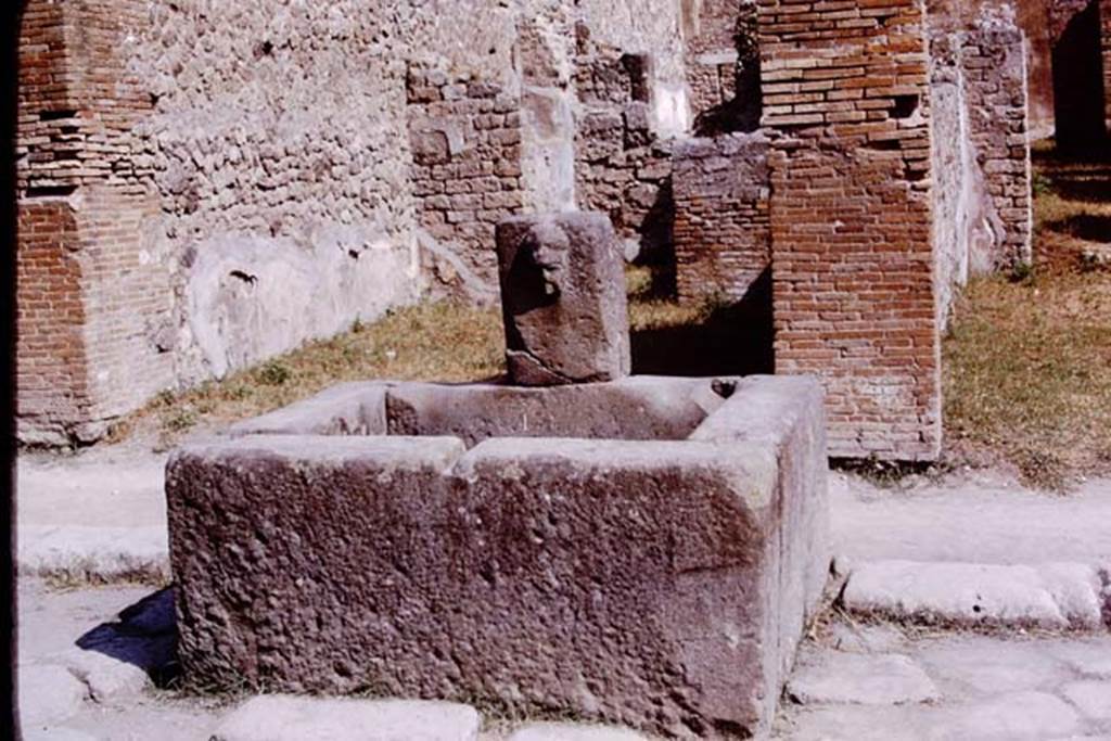Fountain outside VII.14.13 and VII.14.14 on Via dell’Abbondanza, Pompeii. 1975. Photo by Stanley A. Jashemski.   
Source: The Wilhelmina and Stanley A. Jashemski archive in the University of Maryland Library, Special Collections (See collection page) and made available under the Creative Commons Attribution-Non Commercial License v.4. See Licence and use details. J75f0373