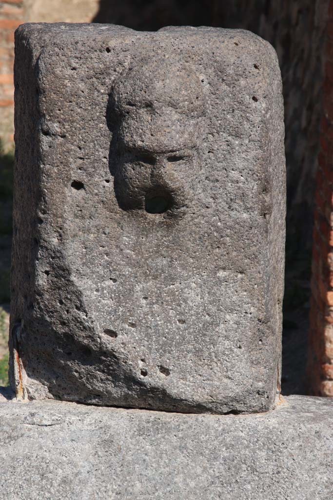 Fountain outside VII.14.13 and VII.14.14 on north side of Via dell’Abbondanza. September 2017. 
Head with helmet, possible a relief of Minerva.  Photo courtesy of Klaus Heese.