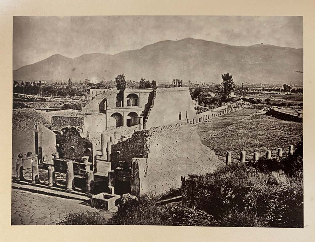 Fountain outside VIII.7.30 Pompeii. 1867 photo by G. Sommer, looking down on the fountain, the Triangular Forum and Large Theatre. 
Photo courtesy of Rick Bauer.
According to Rick, this photo was taken from the high elevation point of the ash pile, prior to its removal.