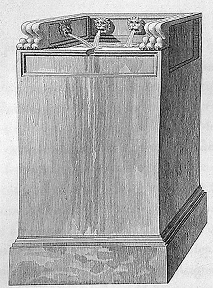 1824 drawing of fountain base with four lions’ heads.
According to Mazois this was placed in the camp of soldiers when he drew it. 
It was a graceful composition and had to belong to some private building.
It was removed in 1810.
See Mazois, F., 1824. Les Ruines de Pompei: Second Partie. Paris: Firmin Didot. (p. 37 Plate III, Fig II).
According to Eschebach the remains of this fountain were removed in 1810 and have not been found again.
See Eschebach, H., 1983. Pompeii, Herculaneum, Stabiae; Bollettino dell’Associazione Internazionale Amici di Pompei 1.  (p. 30, fig 40).