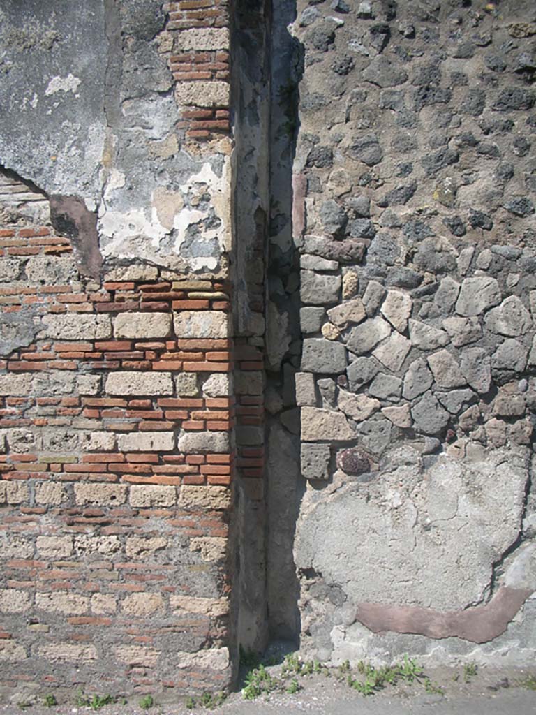 Porta Ercolano or Herculaneum Gate, Pompeii. May 2010. 
Detail from east side of gate at north end, area of “portcullis”. Photo courtesy of Ivo van der Graaff.