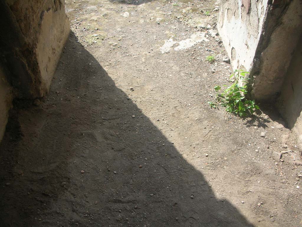 Porta Ercolano or Herculaneum Gate, Pompeii. May 2010. 
Flooring on north end of south side of east side of gate. Photo courtesy of Ivo van der Graaff.