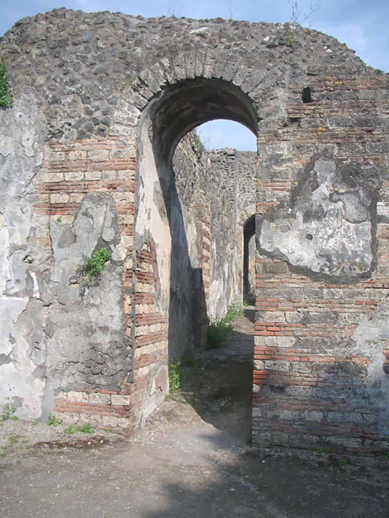 Porta Ercolano or Herculaneum Gate, Pompeii. May 2010. 
Looking south through east side of gate from Via dei Sepolcri. Photo courtesy of Ivo van der Graaff.