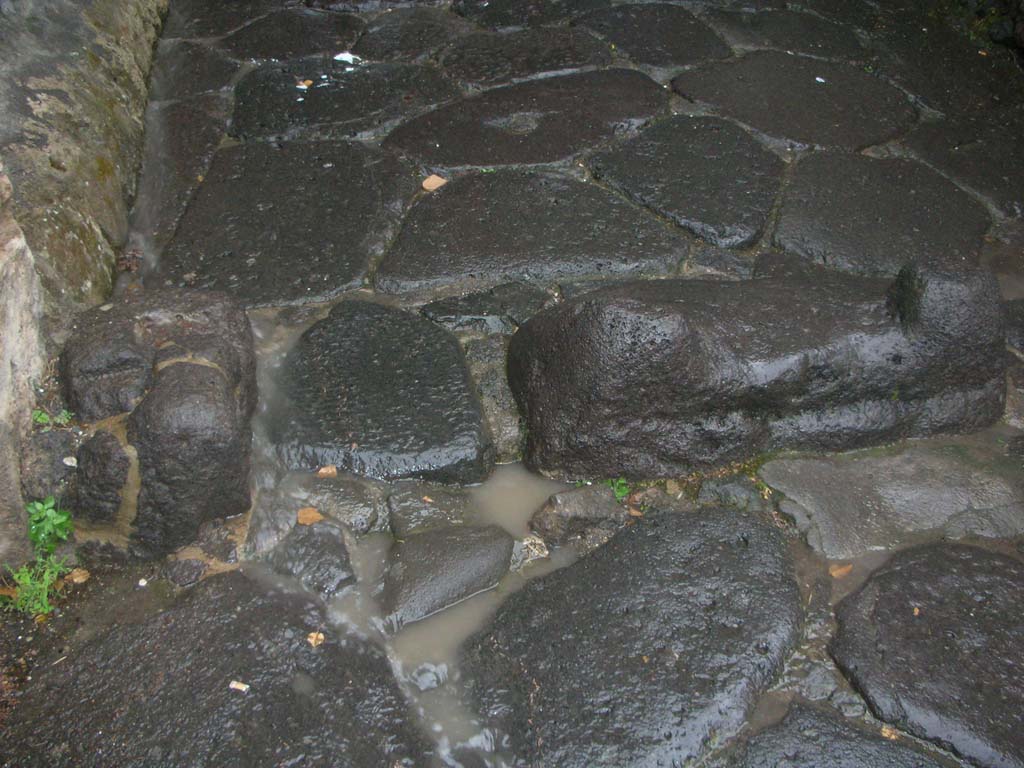 Porta Marina, Pompeii. May 2011. 
Looking towards lava blocks on north side of wider tunnel of gate. Photo courtesy of Ivo van der Graaff.