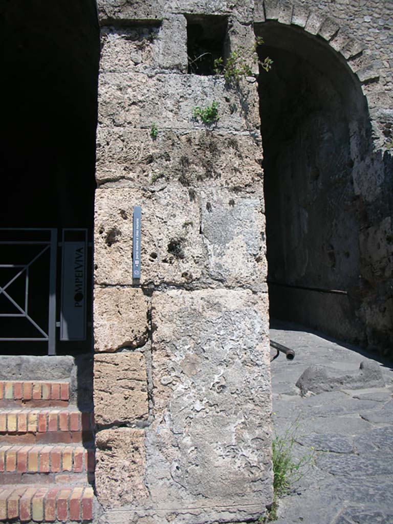 Porta Marina, Pompeii. May 2011. 
Pilaster on south side of pedestrian tunnel, on left. Photo courtesy of Ivo van der Graaff.