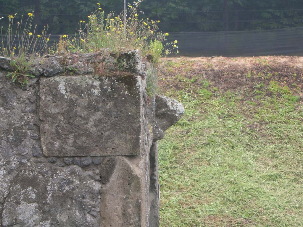 Nola Gate, Pompeii. May 2010. 
Looking south towards upper west side of gate, with head of Minerva. Photo courtesy of Ivo van der Graaff.