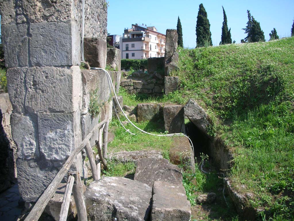 Porta di Nocera or Nuceria Gate, Pompeii. May 2010. 
Looking south along west exterior wall and course of drain. Photo courtesy of Ivo van der Graaff.