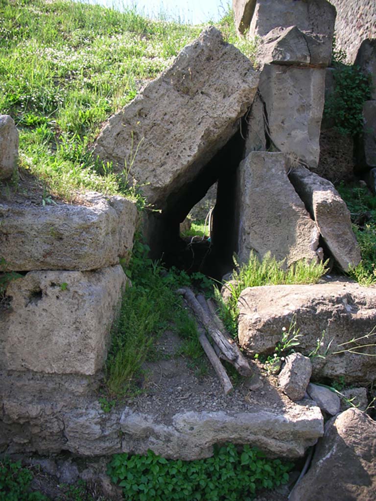 Porta di Nocera or Nuceria Gate, Pompeii. May 2010. 
Looking north along course of drain, from south end on west side of gate. Photo courtesy of Ivo van der Graaff.
