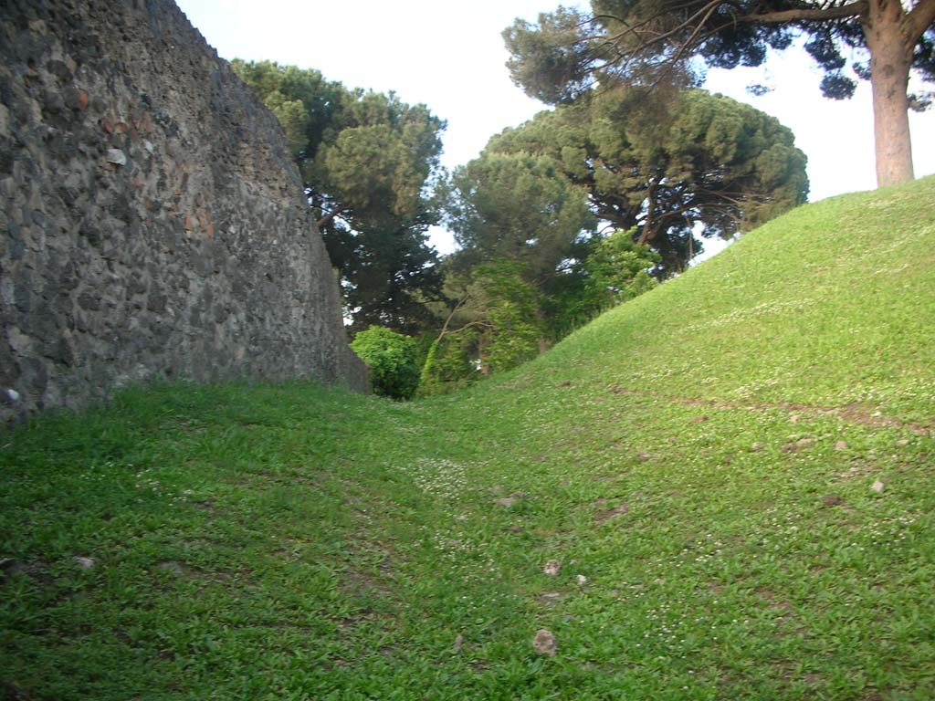 Porta di Nocera or Nuceria Gate, Pompeii. May 2010. 
Looking along north side of agger from east side of north end of gate. Photo courtesy of Ivo van der Graaff.