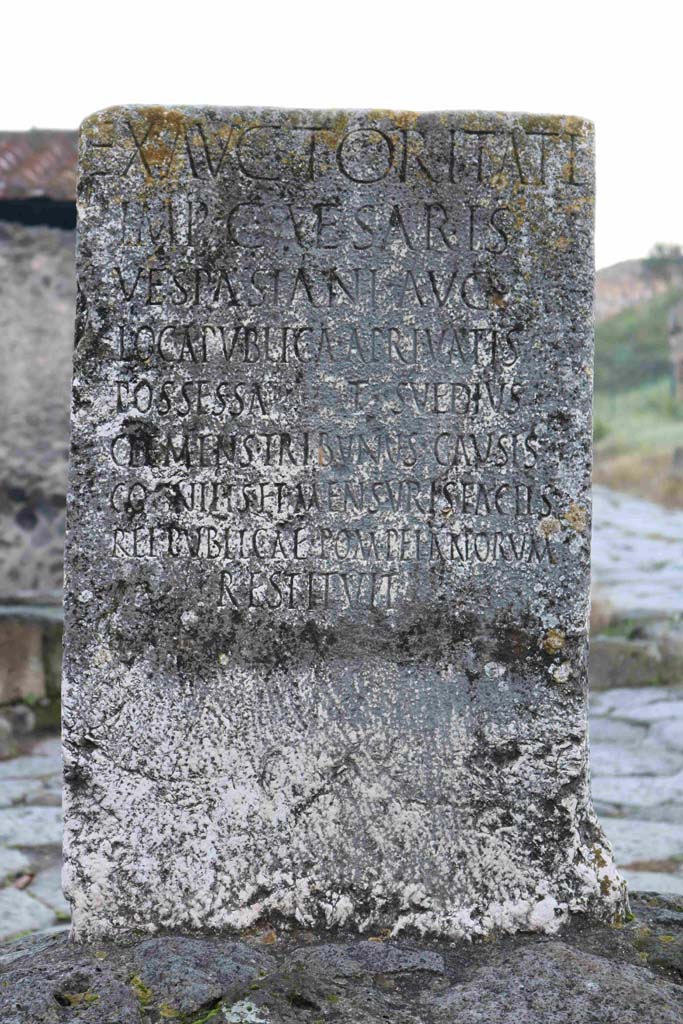 Pompeii Porta di Nocera. December 2018. 
Cippus of Titus Suedius Clemens, south side, looking north. Photo courtesy of Aude Durand.