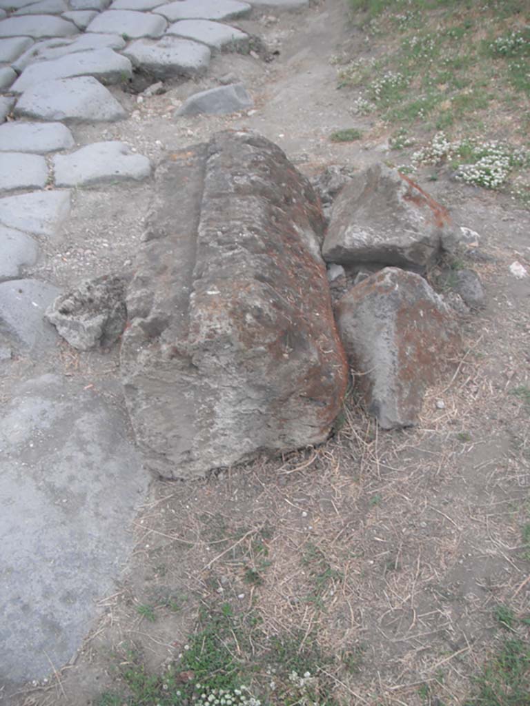 Porta Nocera, Pompeii. May 2011. 
Looking north along east side of gate at south end, with detail of Merlon capping stone. 
Photo courtesy of Ivo van der Graaff.
