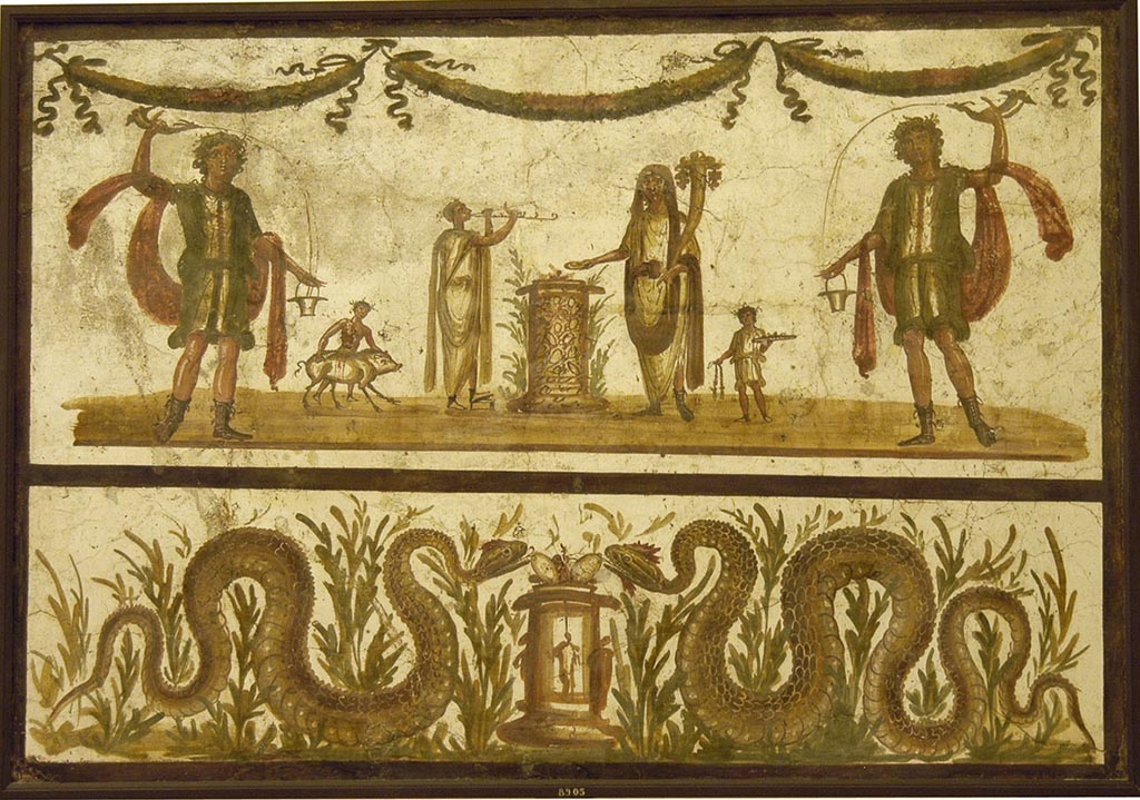 VII.6.38 Pompeii. May 2010. Lararium painting from the kitchen.
The upper part has an offering scene.  A round altar is in the centre.  
The offering Genius has a small camillus helping on his right.  
On the other side of the altar is the tibicen with a popa assisting with a small pig.  
The scene is flanked on either side by a large lar.  Above the scene are three garlands.
The lower part has two serpents, in plants, approaching a second, round altar, one from either side.
Fröhlich says this was found in Reg. VII or VIII.  
See Fröhlich, T., 1991. Lararien und Fassadenbilder in den Vesuvstädten. Mainz: von Zabern. (p. 292, L98, T: 10,2).
Pagano and Prisciandaro show this as being from VII.6.38.
See Pagano, M., and Prisciandaro, R., 2006. Studio sulle provenienze degli oggetti rinvenuti negli scavi borbonici del regno di Napoli. Naples: Nicola Longobardi.  (p.39).
Now in Naples Archaeological Museum. Inventory number: 8905.