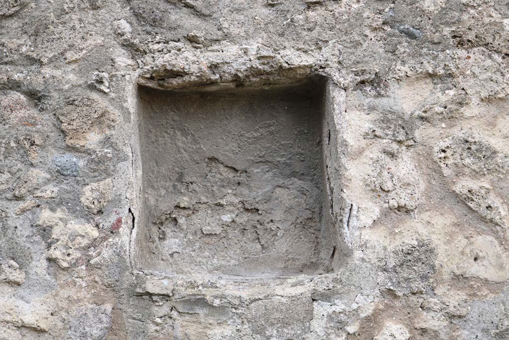 VII.9.22 Pompeii. December 2018. Looking towards niche in west wall. Photo courtesy of Aude Durand.
According to Boyce, in the west wall is a rectangular niche (h.0.45, w.0.48, d.0.25, h. above floor 1,65), called by Fiorelli “un larario”.
See Fiorelli, G., 1875. Descrizione di Pompei. Napoli, p. 266.
See Boyce G. K., 1937. Corpus of the Lararia of Pompeii. Rome: MAAR 14. (p.68, no.302)