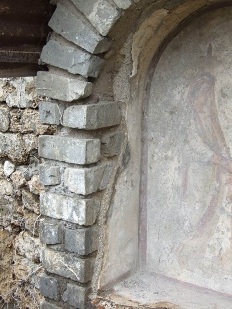 VII.11.14 Pompeii. March 2009. Garden “C”, painting of Genius on lararium.
