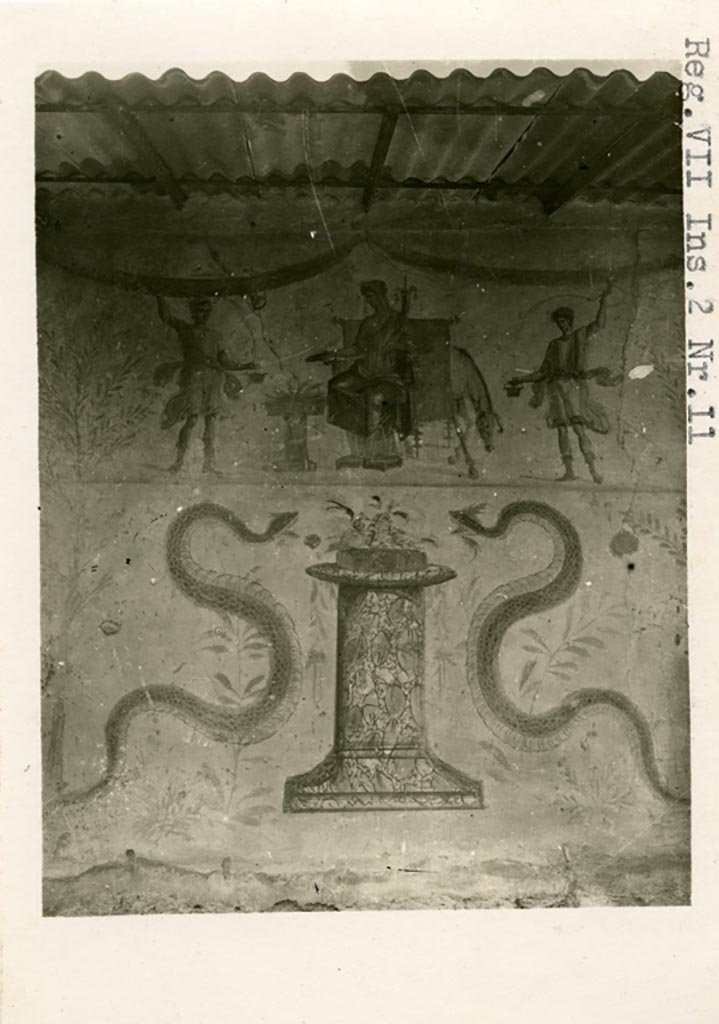 VII.12.11 Pompeii, but shown on photo as from VII.2.11. Pre-1937-39. Painted lararium on west wall. 
Photo courtesy of American Academy in Rome, Photographic Archive. Warsher collection no. 952.
