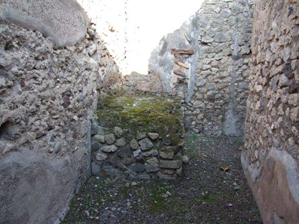 VII.15.13 Pompeii. December 2007. Looking east across kitchen area with lararium.