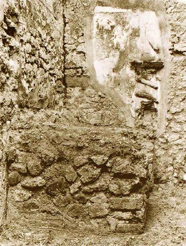 VII.15.13 Pompeii. 1978. Lararium above hearth in kitchen area.