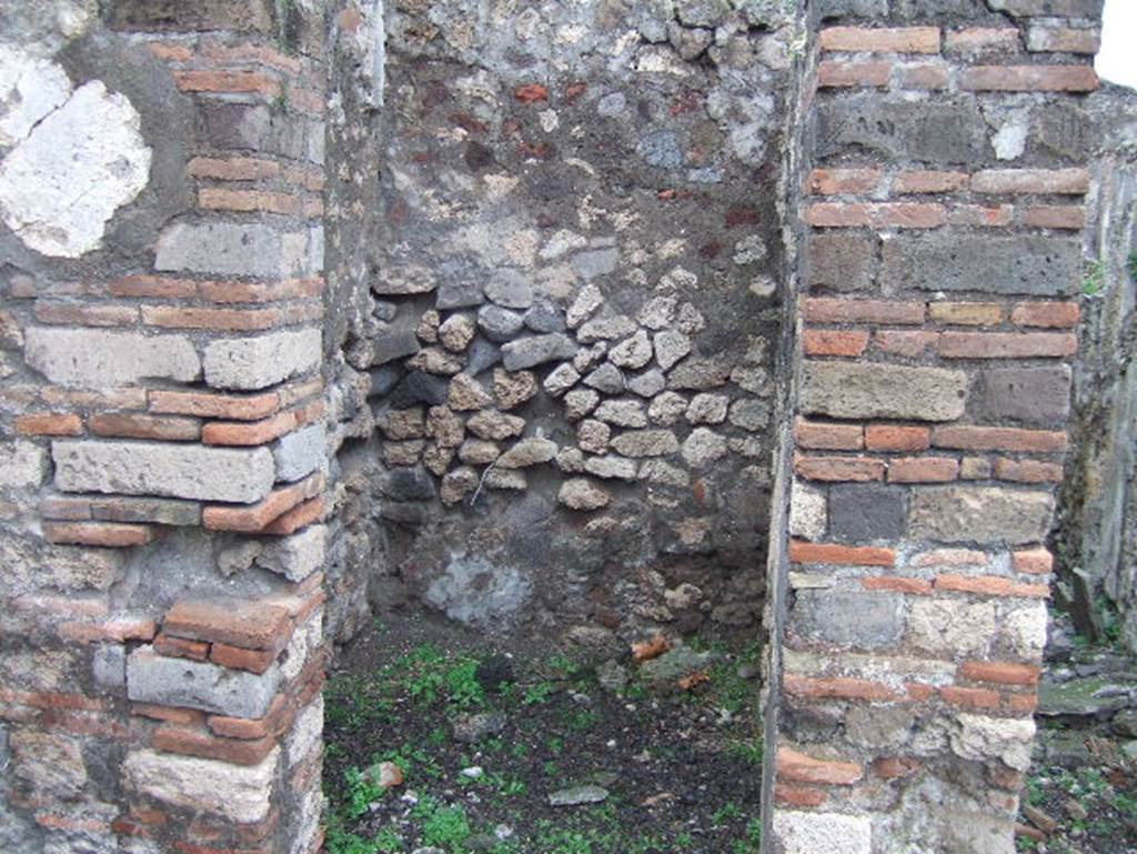 VIII.2.3 Pompeii. December 2005. Small room on north-west corner of the peristyle.  According to Boyce, off the north-west corner of the peristyle opened a small room which Mazois and Fiorelli called the lararium. See Boyce G. K., 1937. Corpus of the Lararia of Pompeii. Rome: MAAR 14. (p.74, no.342)