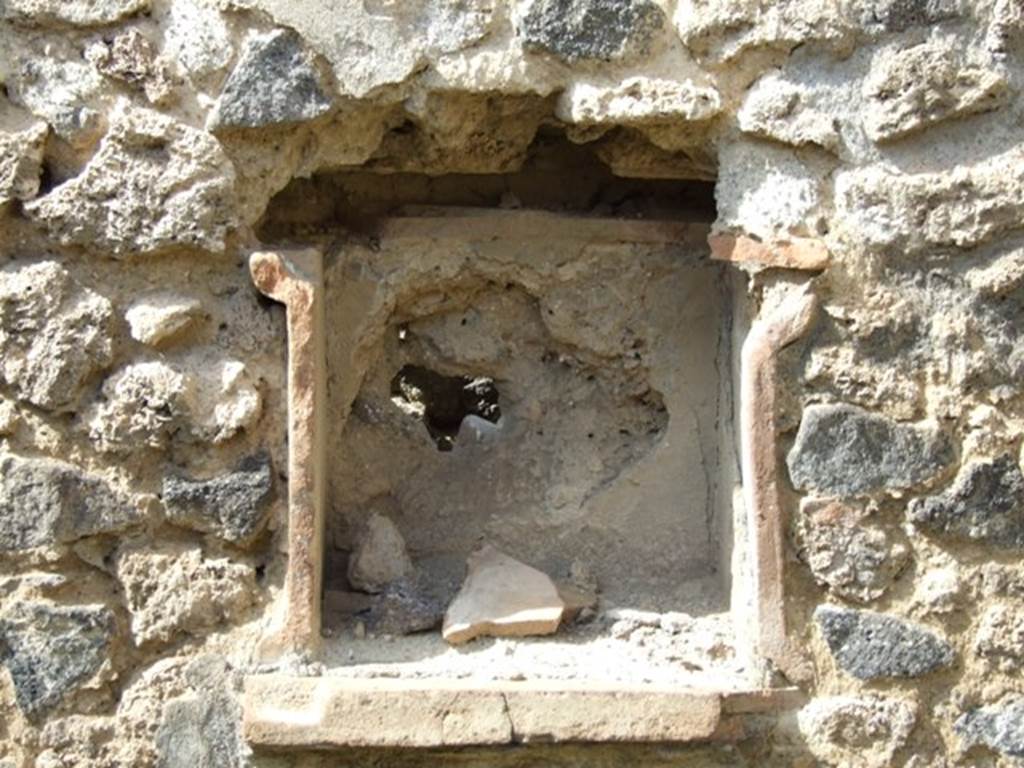 IX.2.5 Pompeii. March 2009. Niche lararium in north wall of garden. According to Boyce, this square niche was called la nicchia de’ Penati, by Fiorelli. See Boyce G. K., 1937. Corpus of the Lararia of Pompeii. Rome: MAAR 14. (p. 80)  See Pappalardo, U., 2001. La Descrizione di Pompei per Giuseppe Fiorelli (1875). Napoli: Massa Editore. (p.141)