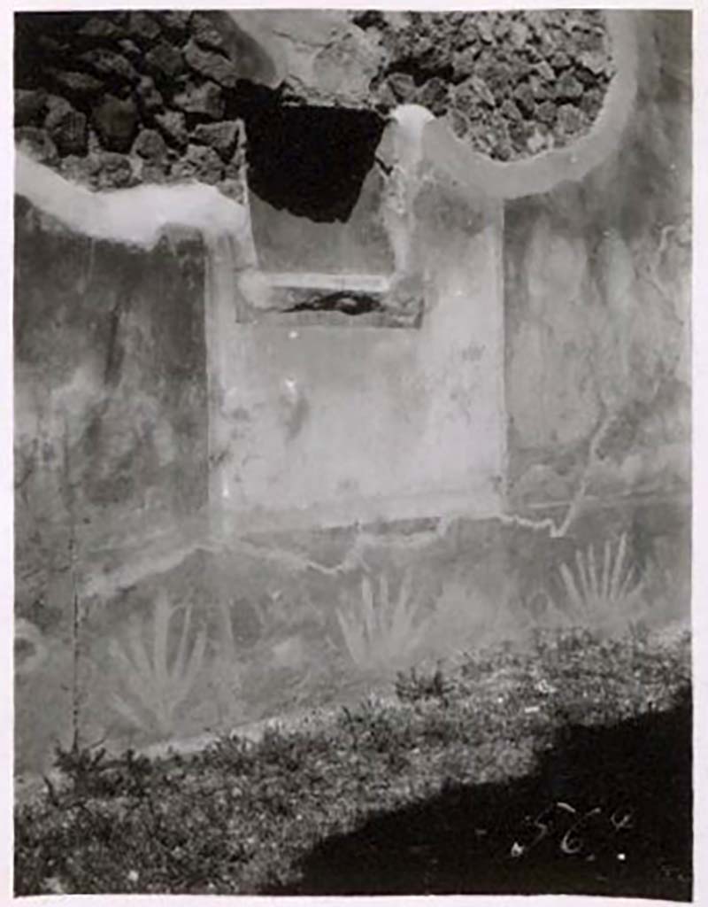 IX.2.12 Pompeii. Pre-1943. Niche in north wall of shop-room. Photo by Tatiana Warscher.
According to Warscher –
“In the north wall of the room entered at No.11 is an arched niche (h.0.45 x w.0.38 x depth 0.25, height above the floor 1.30.)
In the north wall of the room entered at No.12 is a square niche (0.50 square, depth0.24, height above the floor 1.25.)
Both are painted red on the inside: either or both of them may have been the lararia.
See Fiorelli, Scavi, 56, Descr. 381. ”
See Warscher, T. Codex Topographicus Pompeianus, IX.2. (1943), Swedish Institute, Rome. (no.41.), p. 100.