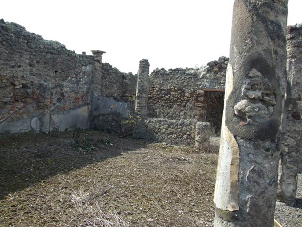IX.2.17 Pompeii. March 2009. Room 9, garden area. Looking north-west towards north side and columns at the west end.
According to Boyce, the two columns at the west end of the north row were connected by a low wall (present height 1.50).
On the south side of this wall, facing the open area, was painted in red a simple aedicula with pediment (h.1.10.w.1.70).
Within the aedicula were painted two yellow serpents confronted at an altar. 
See Boyce G. K., 1937. Corpus of the Lararia of Pompeii. Rome: MAAR 14. (p. 81, no. 397B).