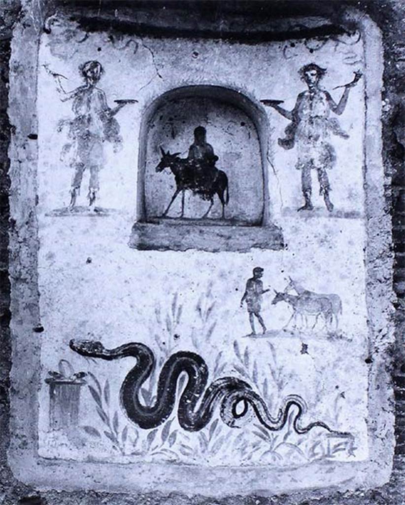 IX.2.24 Pompeii. Old photo of lararium and niche on west wall of stable.
According to Fröhlich, on the lower left was a painted altar with a snake approaching, through plants, from the right.  
Above right was a man leading two donkeys.  
In the niche was a female figure on a donkey, perhaps Vesta, Epona or Isis-Epona. 
Two Lares were at the top, one on either side of the niche.  
See Fröhlich, T., 1991, Lararien und Fassadenbilder in den Vesuvstädten.  Mainz: von Zabern.  (L99: p.293, T. 42,3).
