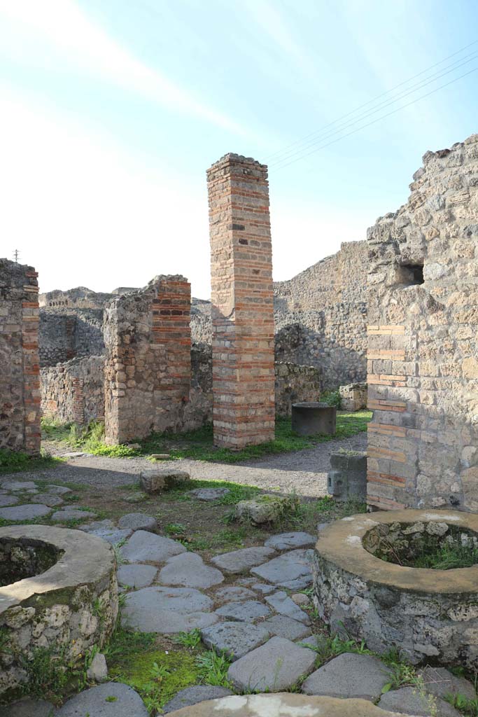 IX.3.12 Pompeii. December 2018. 
Looking north-west towards rectangular pilaster opposite the oven.
Photo courtesy of Aude Durand.