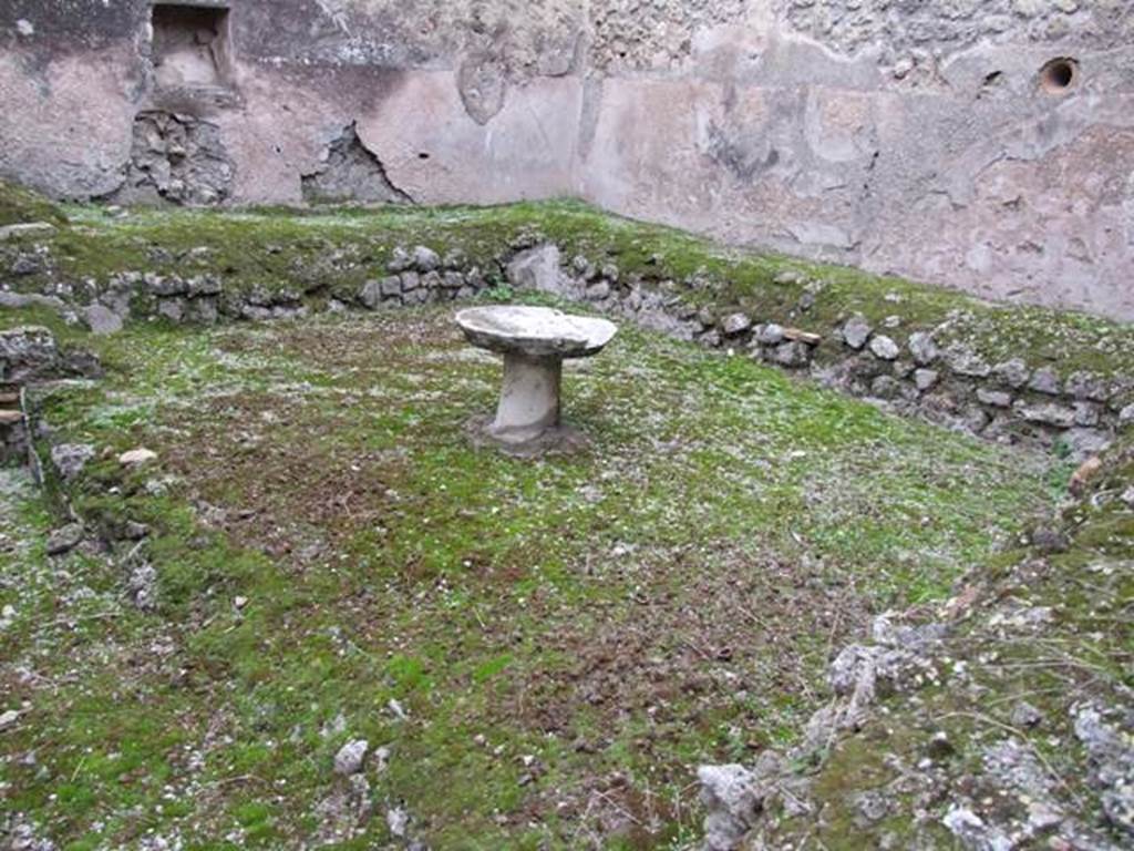 IX.3.20 Pompeii. December 2007. Room 8, garden area. Raised planting bed or bench.
According to Jashemski, the garden had a raised planting bed or bench (0.55m high) along the west, north and east walls. In the centre was a low circular marble table.
See Jashemski, W. F., 1993. The Gardens of Pompeii, Volume II: Appendices. New York: Caratzas. (p.234, no. 482).