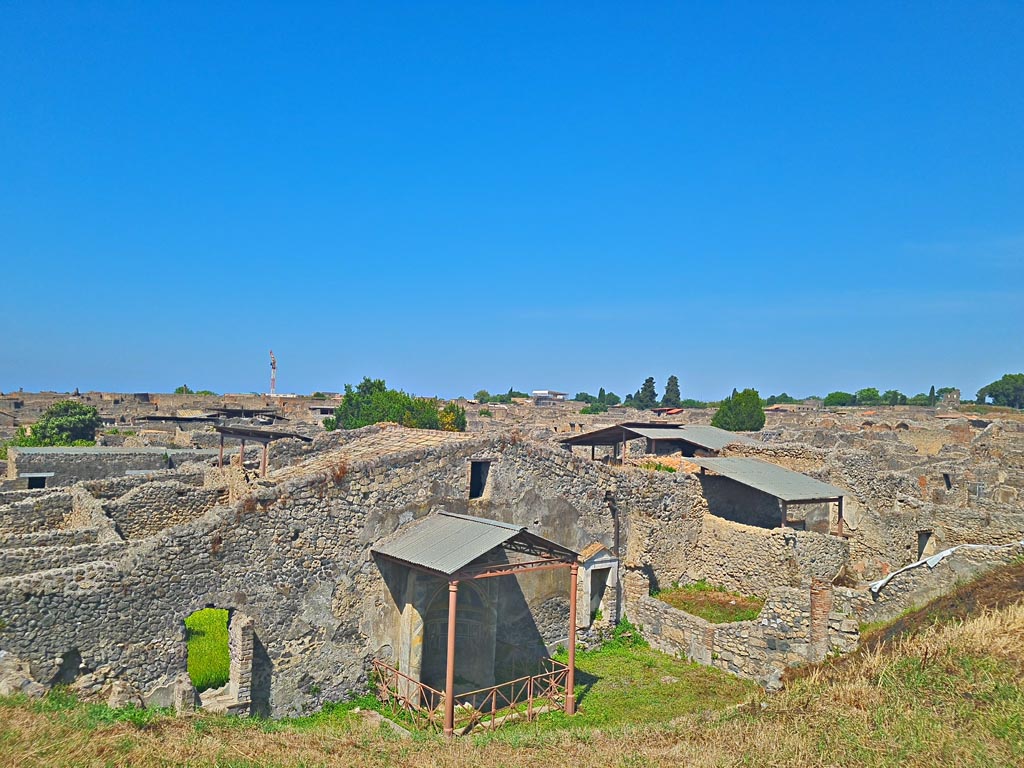 IX.7.20 or IX.7.(?) Pompeii. June 2024. Looking west from above rear of Casina dell’Aquila. Photo courtesy of Giuseppe Ciaramella.