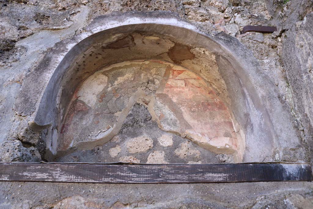 IX.8.b Pompeii. February 2020. Lararium niche set into south wall of atrium. Photo courtesy of Aude Durand.
According to Boyce, this large arched niche (h.0.60, w.0.78, d.0.30, h. above floor 1.90) had its inside walls decorated with a painted pattern representing blocks of coloured marble. The report in the Not. Scavi, called it “la nicchia dei Penati”.
See Notizie degli Scavi di Antichità, 1880, p. 185.
See Boyce G. K., 1937. Corpus of the Lararia of Pompeii. Rome: MAAR 14. (p.90, no.451)