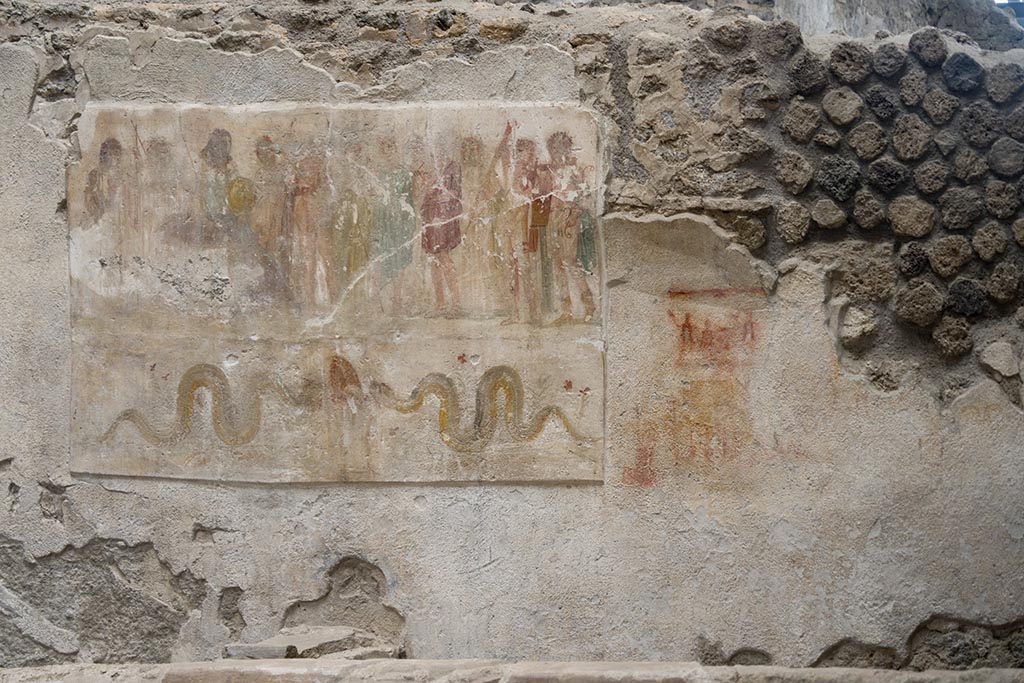 IX.12.6 Pompeii. July 2024. 
Room “n1”, west wall with lararium painting, on the right is the preparatory sketch. Photo courtesy of Johannes Eber.