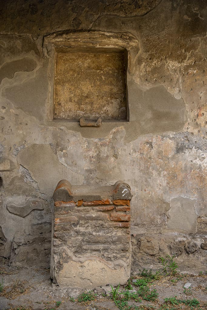 Villa of Mysteries, Pompeii. July 2024. 
Room 61, looking north towards niche and altar. Photo courtesy of Johannes Eber.