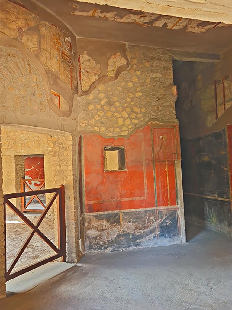 Oplontis Villa of Poppea, October 2023. 
Room 66, looking towards south wall with niche, and south-west corner. 
On the right is corridor 77, and the west wall. Photo courtesy of Giuseppe Ciaramella.