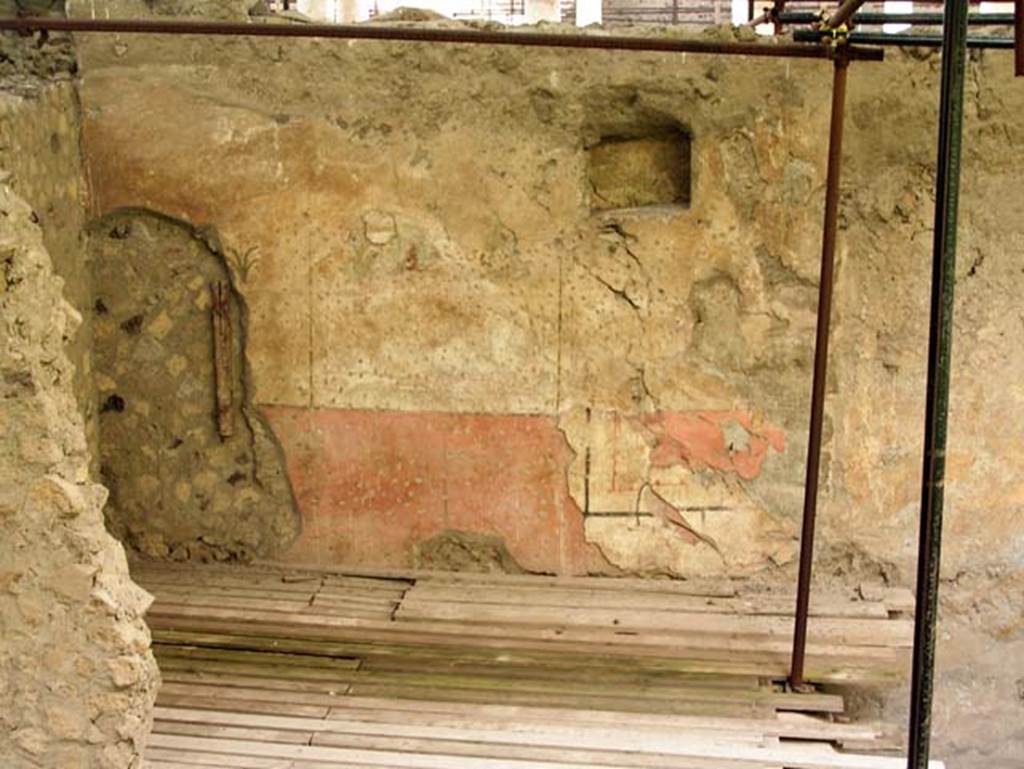 Oplontis, Villa of Lucius Crassius Tertius. March 2005. Room on north side with niche and what appears to be two layers of painted decoration. 
Photo courtesy of Massimo Gravili.