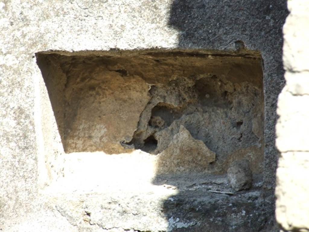 I.2.18 Pompeii. March 2009. Recess in east wall. According to Boyce, this was a rectangular niche with interior walls painted red, found on east wall of taberna.  See Boyce G. K., 1937. Corpus of the Lararia of Pompeii. Rome: MAAR 14. (p.22, number 11A)