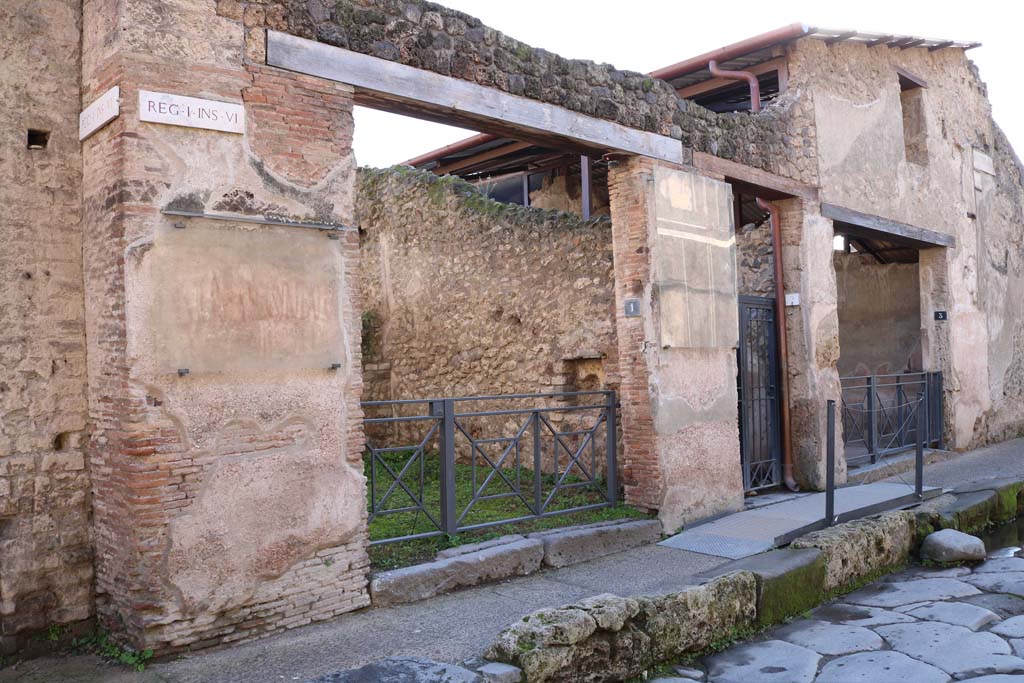 I.6.1 Pompeii. December 2018. 
Looking towards entrance and west wall on south side of Via dell’Abbondanza. Photo courtesy of Aude Durand.