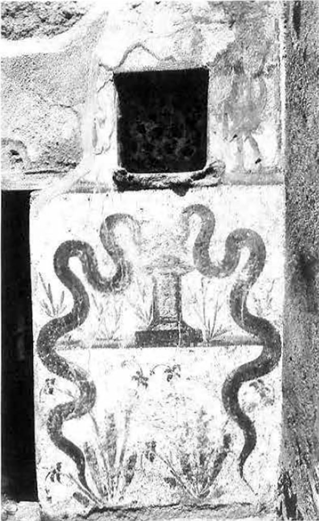 I.8.10 Pompeii. Lararium shortly after excavation.
In the middle of the uppermost zone is the niche, where poppies with purple flowers are painted on the back wall.
There were two Lares, one on either side of the niche.
There were two serpents, one rising either side of a round altar.  
The horizontal line, on which the base of a round altar rested, was about halfway up the serpent’s body.
The background of the middle zone is formed by oleander-like plants.
The lowest zone is filled by two perennial plants, probably lilies.
See Fröhlich, T., 1991. Lararien und Fassadenbilder in den Vesuvstädten. Mainz: von Zabern. (L9: p.253, T25.2).