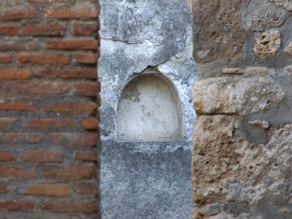 I.11.3 Pompeii.  December   2007.  Niche on south wall of the garden viewed through kitchen doorway.