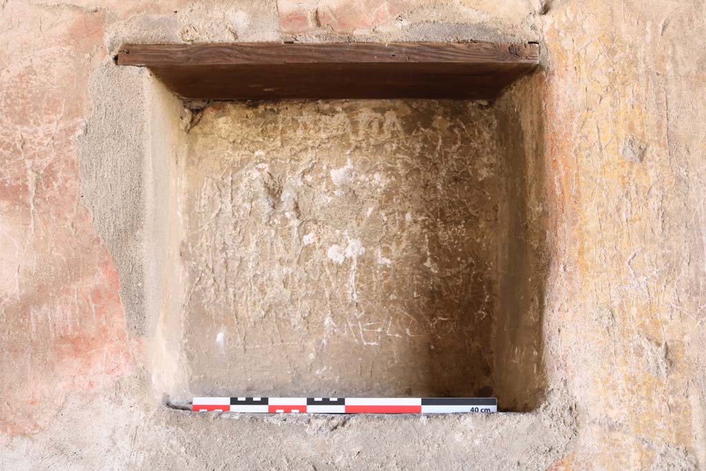 I.11.7 Pompeii. December 2018. Square niche in west wall. Photo courtesy of Aude Durand.