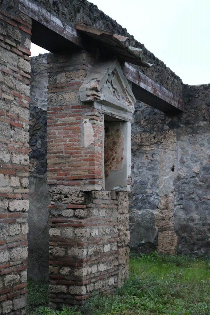 I.13.12 Pompeii. December 2018. 
West side of atrium, doorway to cubiculum, lararium and ala. Photo courtesy of Aude Durand.