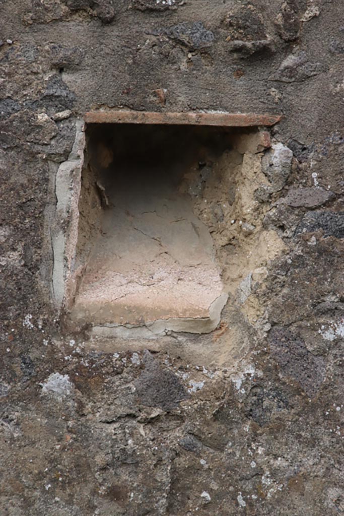 I.15.3 Pompeii. May 2024. 
Detail of niche in west wall of garden/vineyard near north-west corner. Photo courtesy of Klaus Heese.