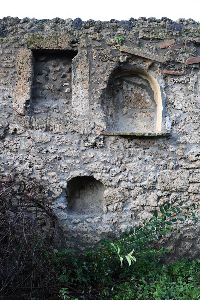 I.21.3 Pompeii. December 2018. 
Looking towards west wall with niches. Photo courtesy of Aude Durand.
