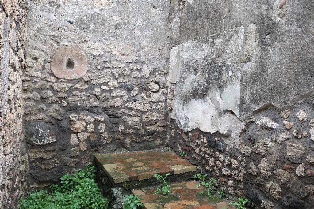 II.1.13 Pompeii. December 2018. 
Looking towards east wall of kitchen, and south wall with remains of painted decoration. Photo courtesy of Aude Durand.